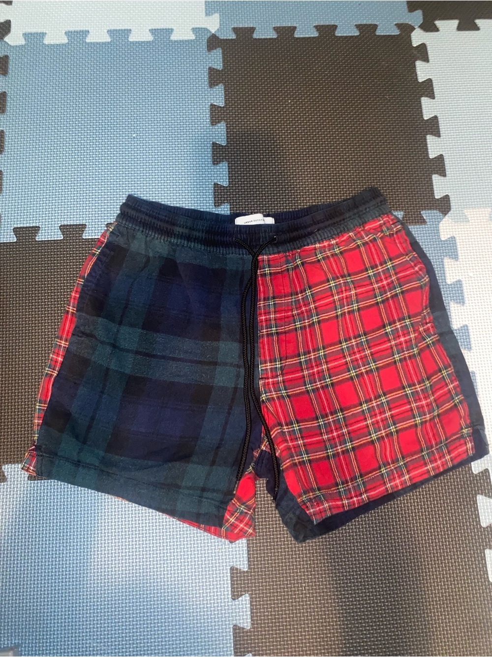 Urban Outfitters mismatched plaid shorts
